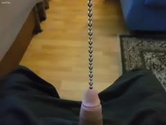 Kinky dude putting chains inside his dick